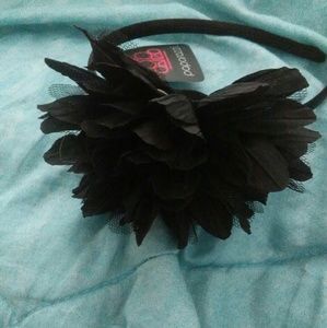 A black flower headband